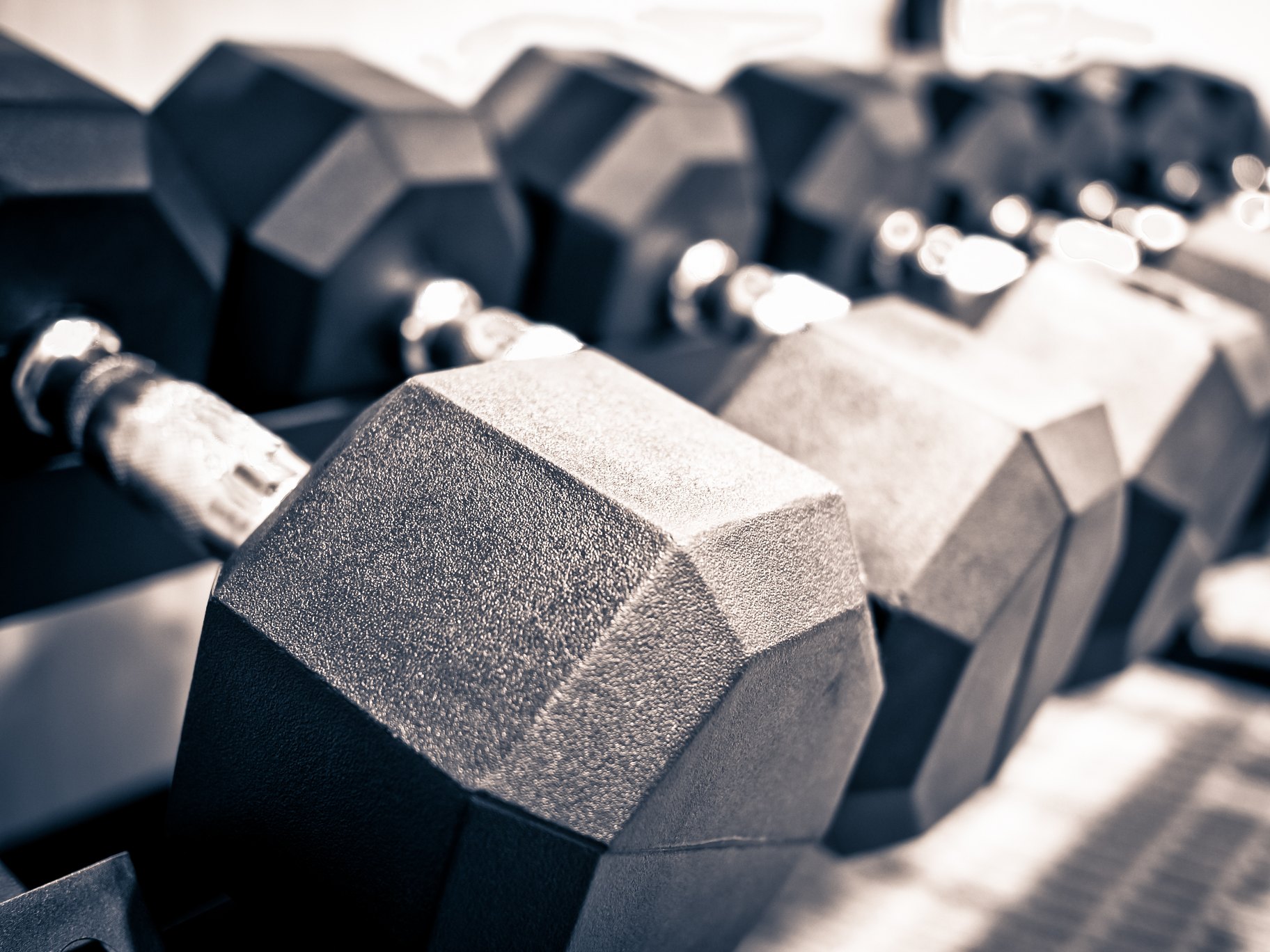Rack of hand free weight dumbbells at a healthclub gym